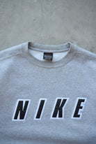 Nike Grey Embroidered Spellout Crewneck — 1990s (M) - Retrospective Store