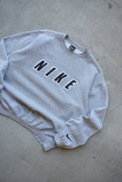 Nike Grey Embroidered Spellout Crewneck — 1990s (M) - Retrospective Store