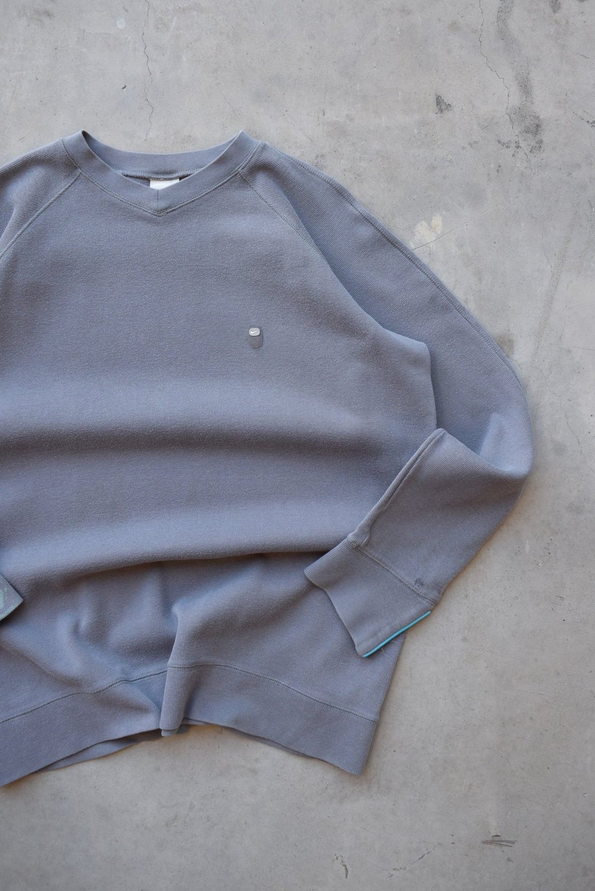Nike Grey Embroidered Swoosh Crewneck — 2000s (L/XL) - Retrospective Store