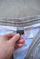 Nike Grey Embroidered Swoosh Track Pants — 2000s (XL/XXL) - Retrospective Store