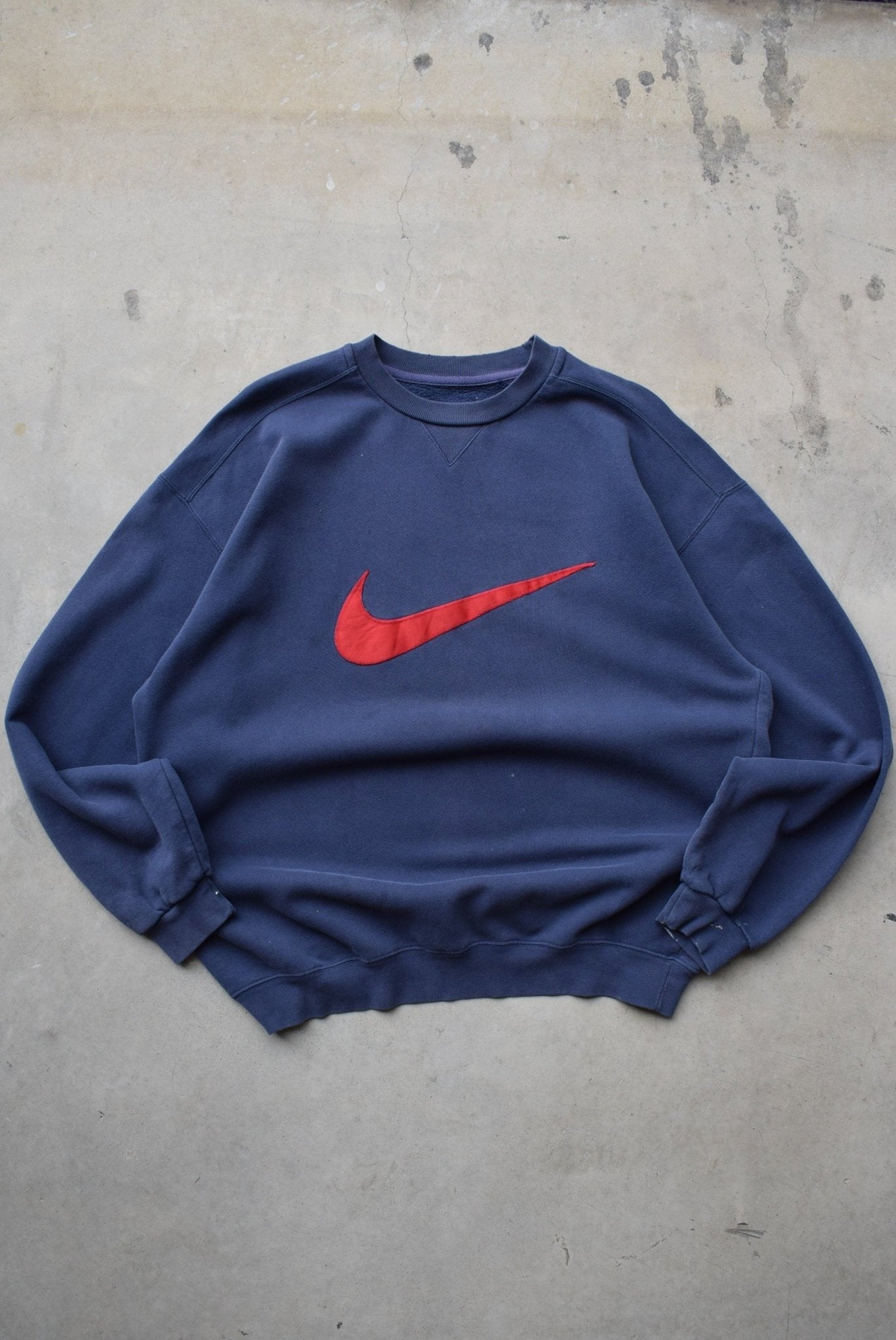 Nike Navy Embroidered Swoosh Crewneck — 1990s (XL) - Retrospective Store