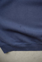 Nike Navy Embroidered Swoosh Crewneck — 1990s (XL) - Retrospective Store