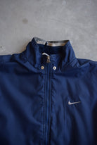 Nike Navy Embroidered Swoosh Heavyweight Jacket — 1990s (L/XL) - Retrospective Store