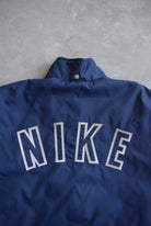 Nike Navy Embroidered Swoosh Heavyweight Jacket — 1990s (L/XL) - Retrospective Store