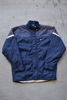 Nike Navy Heavyweight Embroidered Swoosh Jacket — 1990s (L/XL) - Retrospective Store