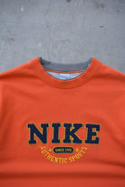 Nike Orange Embroidered Spellout Crewneck — 2000s (L/XL) - Retrospective Store