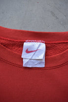 Nike Red Embroidered Swoosh Crewneck — 1990s (L) - Retrospective Store