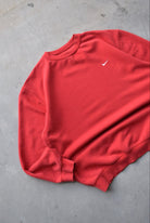 Nike Red Embroidered Swoosh Crewneck — 2000s (L/XL) - Retrospective Store