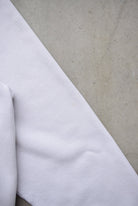 Nike White Embroidered Centre Swoosh Hoodie — 1990s (L) - Retrospective Store