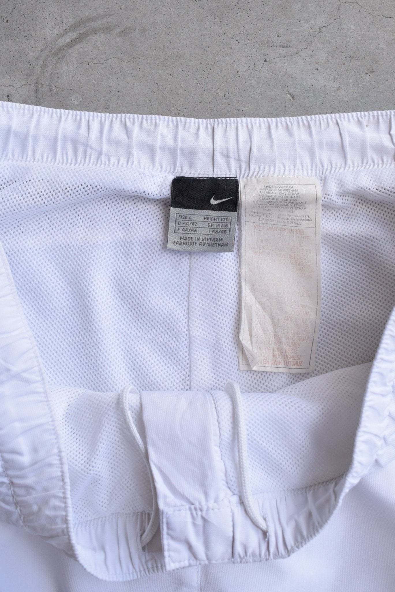 Nike White Embroidered Swoosh 3/4 Track Pants — 2000s (L) - Retrospective Store