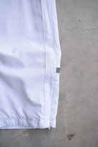 Nike White Embroidered Swoosh 3/4 Track Pants — 2000s (L) - Retrospective Store