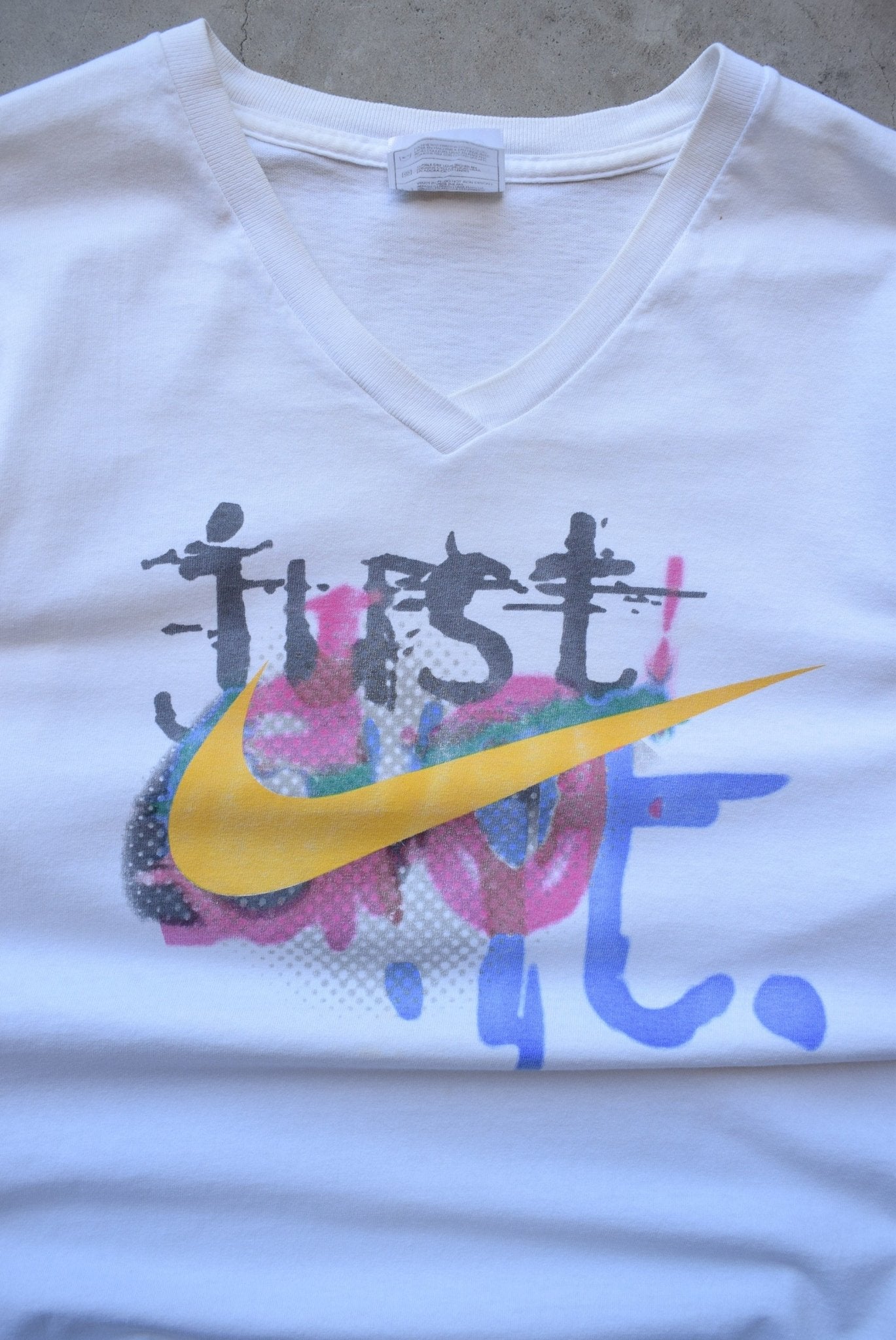 Nike White Graphic Tee — 1990s (S/M) - Retrospective Store