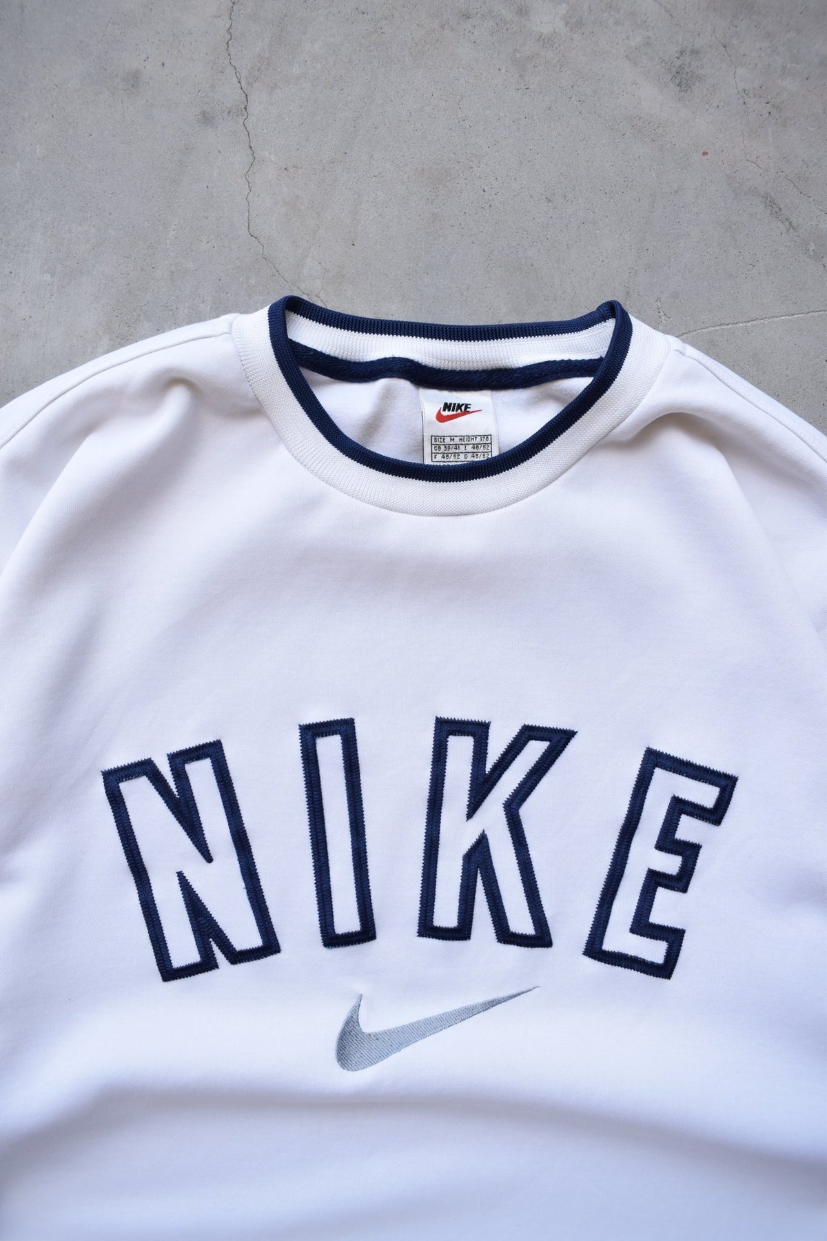 Nike White & Navy Embroidered Spellout Crewneck — 1990s (M) - Retrospective Store
