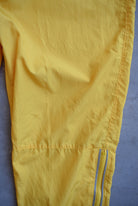 Nike Yellow Embroidered Swoosh Track Pants — 1990s (XS) - Retrospective Store