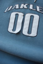 Oakley Blue & Grey Embroidered Spellout Hoodie — 2000s (M) - Retrospective Store