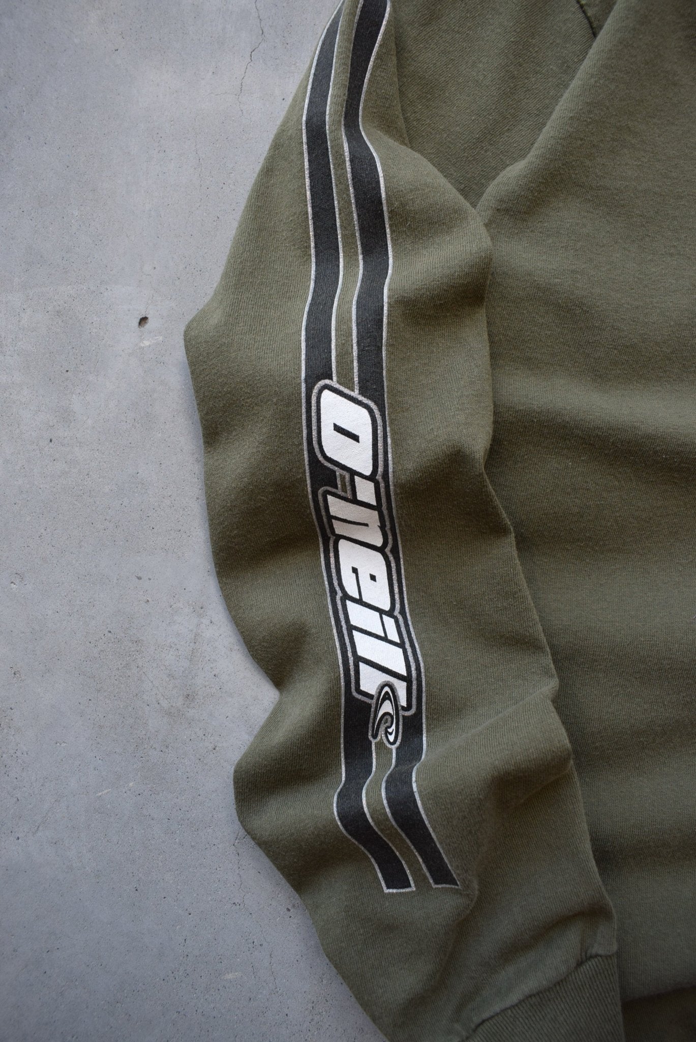 O'Neill USA Surfwear Green Long Sleeve Spellout Tee — 1990s (L) - Retrospective Store