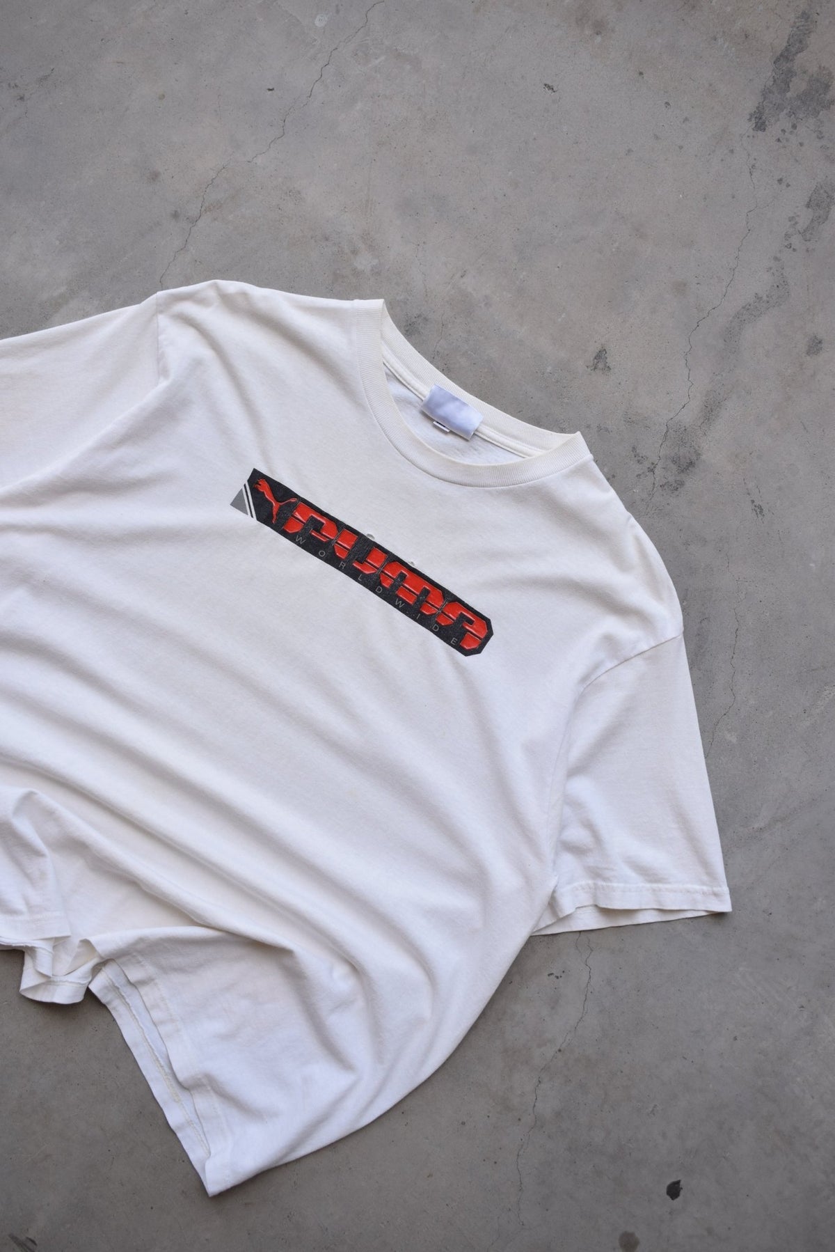Puma Worldwide White Spellout Tee — 2000s (L) - Retrospective Store