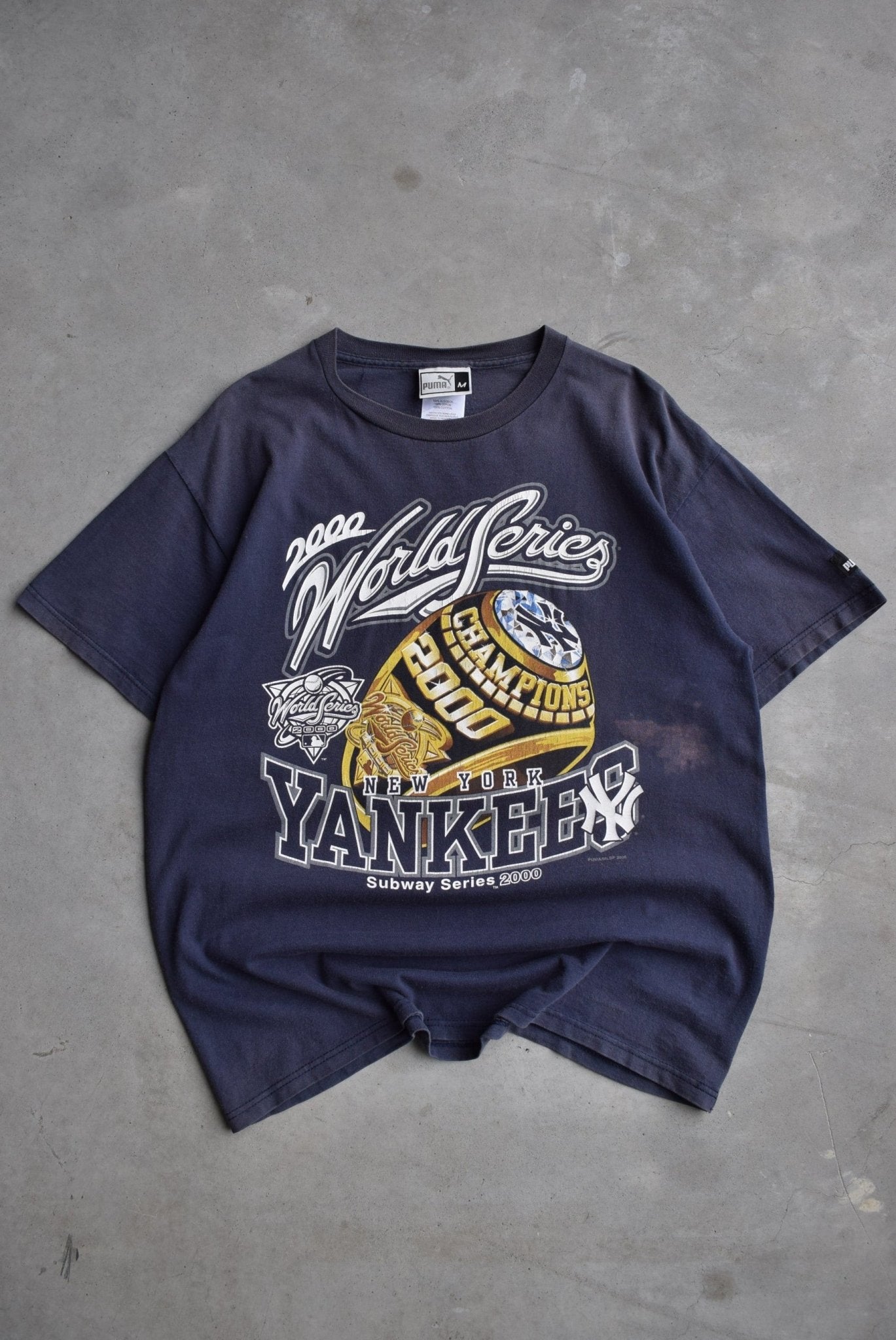 Puma x MLB New York Yankees Champions Navy Graphic Tee — 2000 (L) - Retrospective Store