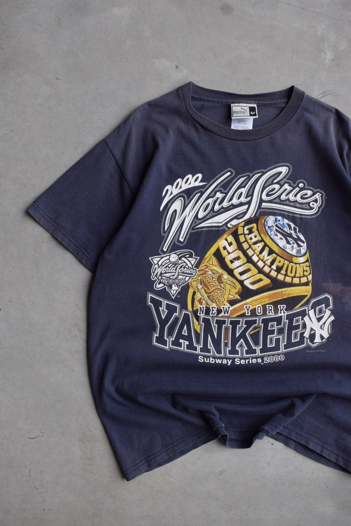 Puma x MLB New York Yankees Champions Navy Graphic Tee — 2000 (L) - Retrospective Store