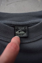 Quiksilver Surfwear Dark-Grey Spellout Crewneck — 1990s (M) - Retrospective Store
