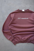 Reebok Brown Embroidered Spellout Crewneck — 1990s (L/XL) - Retrospective Store