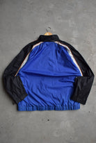 Reebok Classic Logo Embroidered Windbreaker Jacket — 1990s (XL) - Retrospective Store