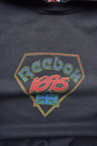 Reebok Faded-Black Spellout Hoodie — 1990s (M/L) - Retrospective Store