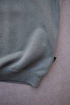 Reebok Moss-Green Embroidered Spellout Crewneck — 1990s (M/L) - Retrospective Store