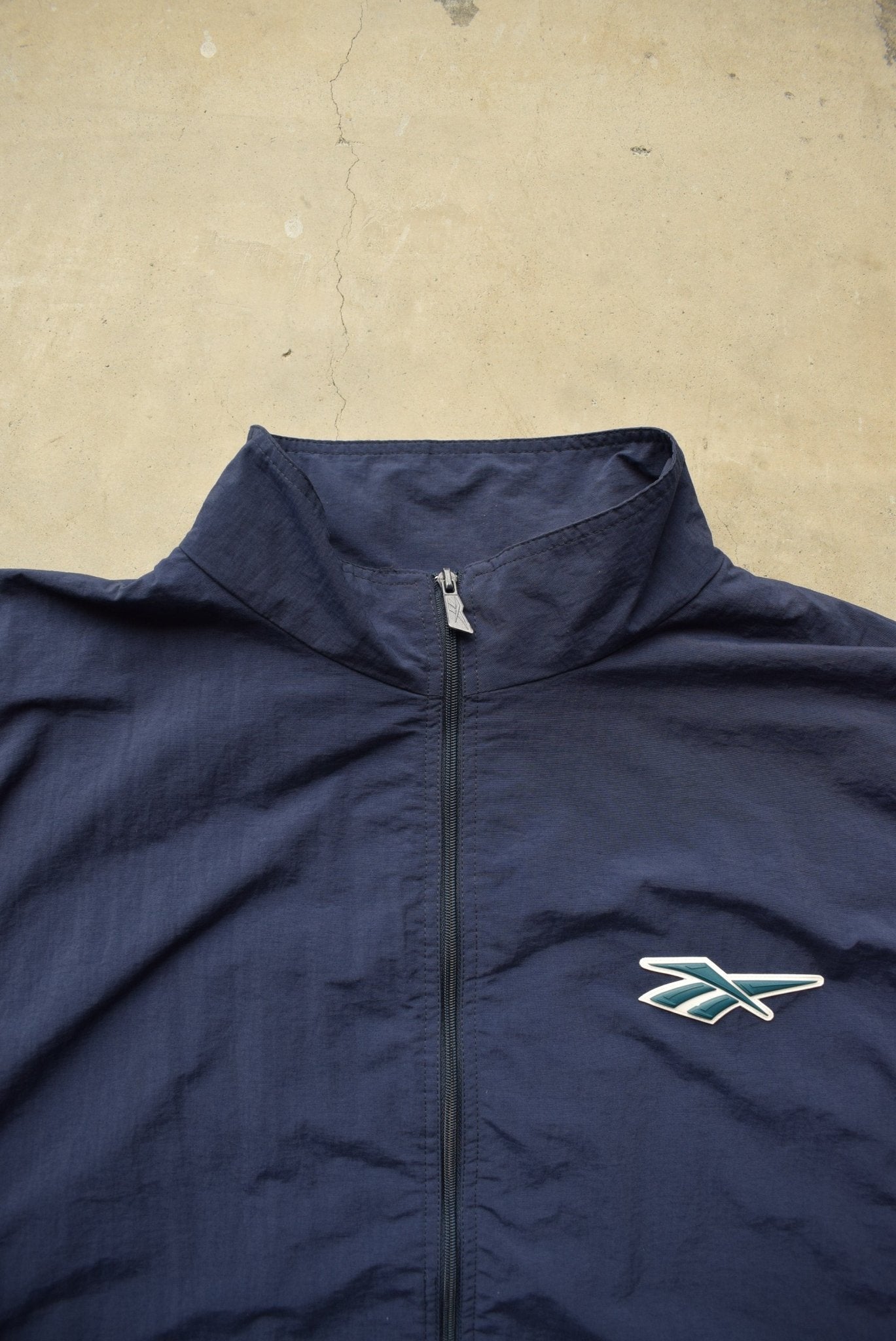 Reebok Navy Embroidered Logo Jacket — 1990s (4XL) - Retrospective Store
