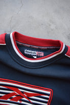 Reebok Navy & Red Embroidered Spellout Crewneck — 1990s (L) - Retrospective Store