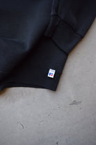 Russell Athletic Black Spellout Crewneck — 1990s (XL) - Retrospective Store