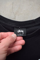 Stussy Black Spellout Tee — 2000s (L) - Retrospective Store
