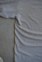 Stussy Grey Spellout Graphic Tee — 2000s (L) - Retrospective Store