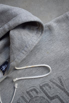 Stussy Grey Spellout Hoodie — 2000s (M/L) - Retrospective Store
