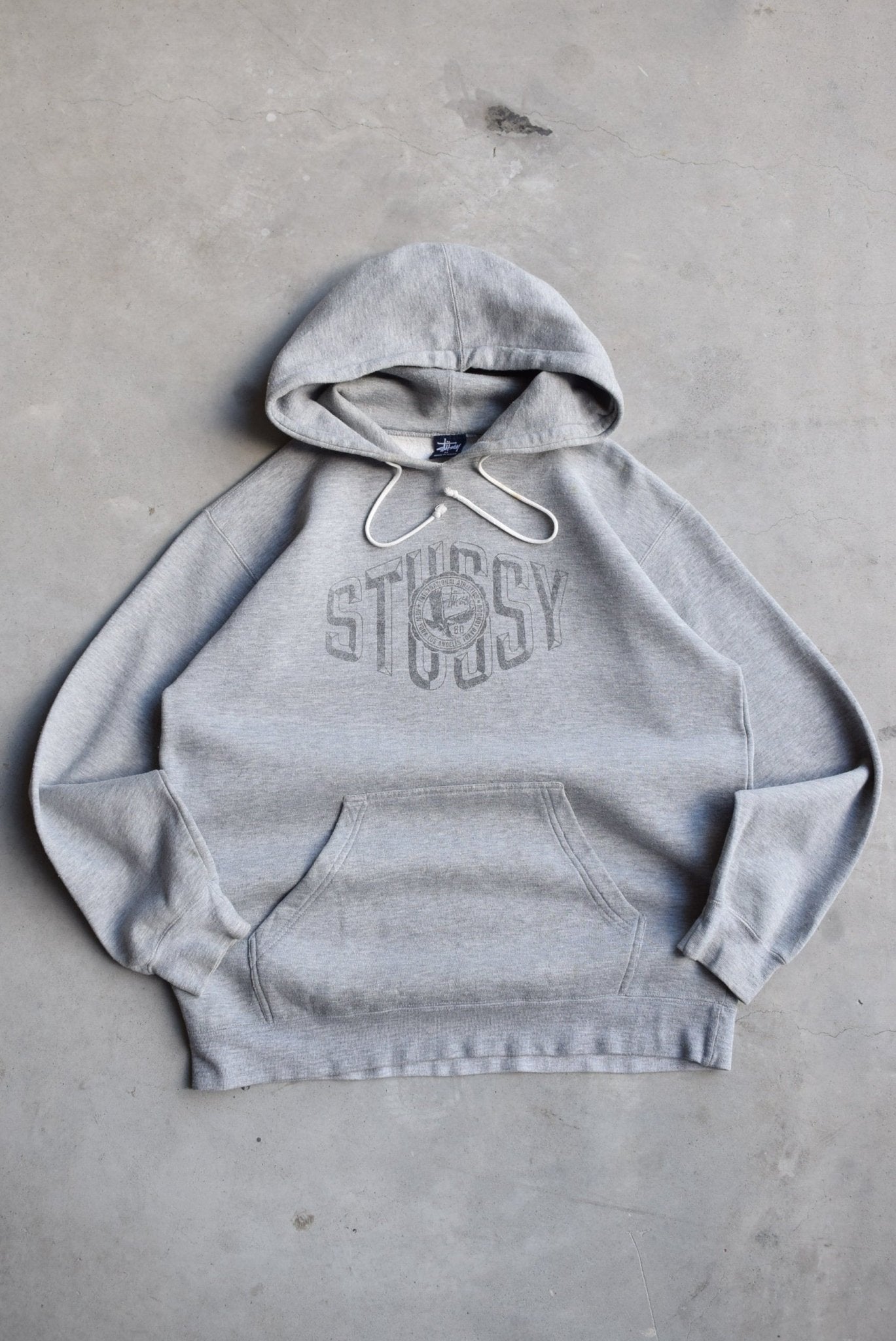 Stussy Grey Spellout Hoodie — 2000s (M/L) - Retrospective Store