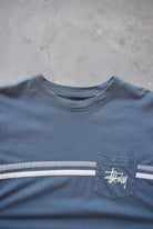 Stussy Navy Spellout Pocket Tee — 1990s (L) - Retrospective Store