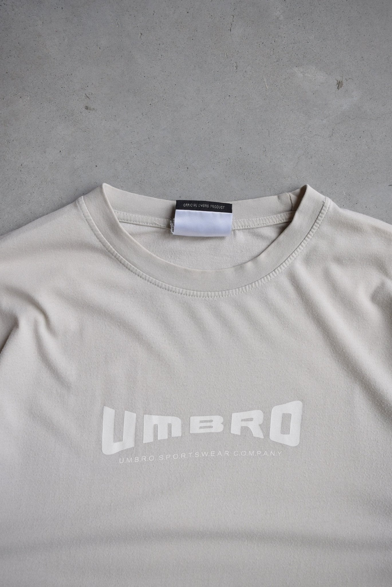 Umbro Cream Spellout Tee — 2000s (L) - Retrospective Store
