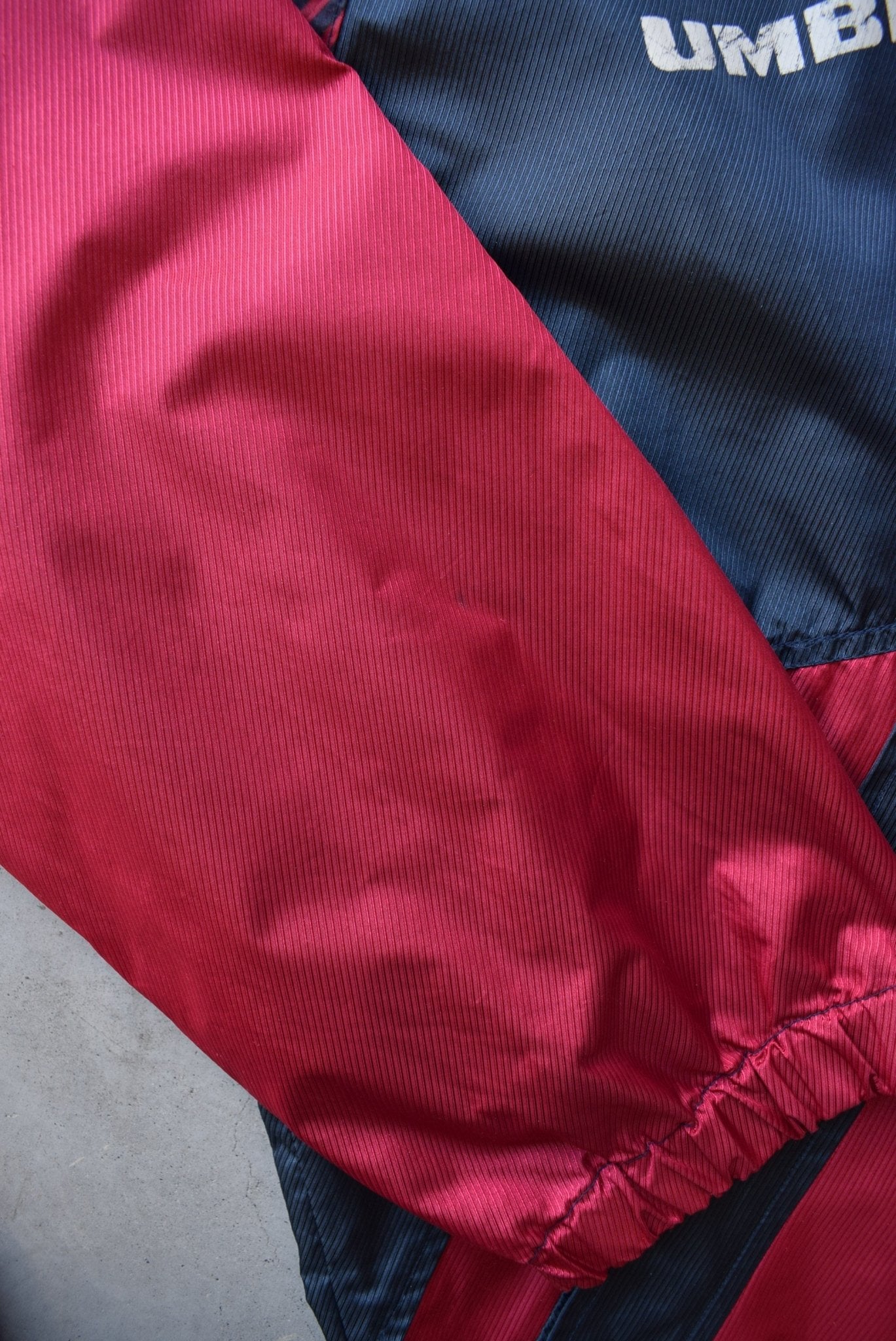 Umbro Red & Navy Spellout Spray Jacket — 1990s (XXL) - Retrospective Store