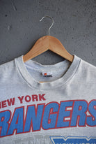 Vintage 1991 Warner Bros. x NHL New York Rangers Tee (XL) - Retrospective Store