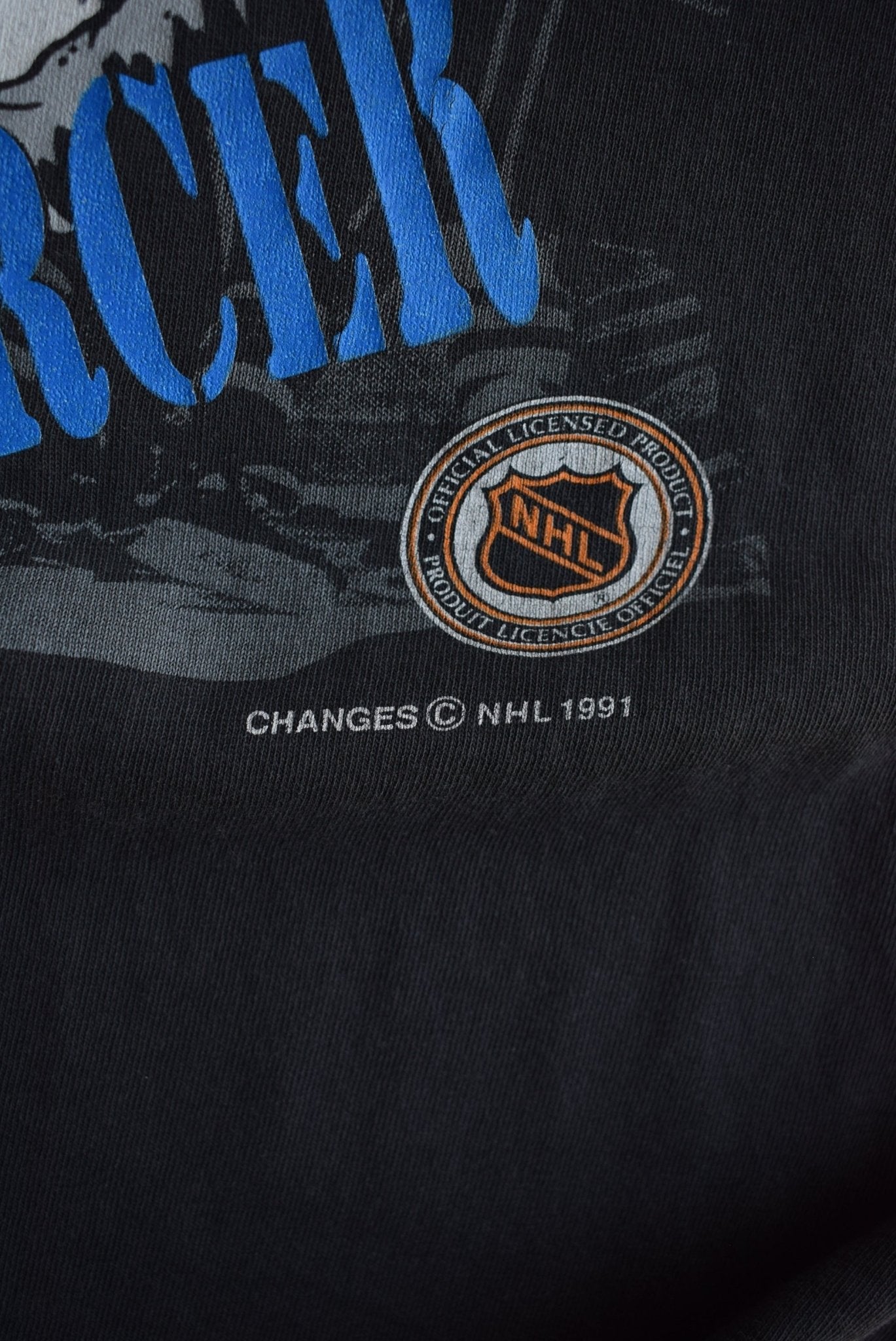 Vintage 1991 Warner Bros. x NHL Washington Capitals Tee (XL) - Retrospective Store