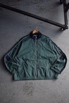 Vintage 90s Nike Spellout Embroidered Windbreaker Jacket (L) - Retrospective Store