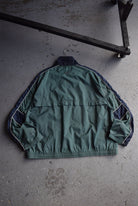 Vintage 90s Nike Spellout Embroidered Windbreaker Jacket (L) - Retrospective Store