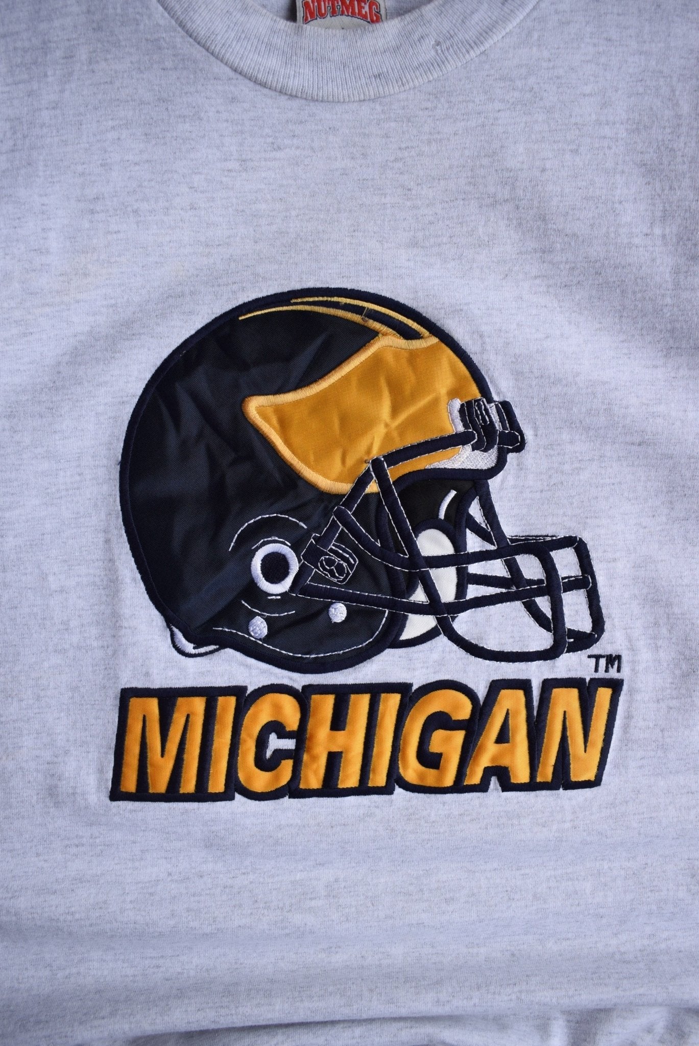 Vintage 90s Nutmeg x University of Michigan Football Embroidered Tee (S/M) - Retrospective Store
