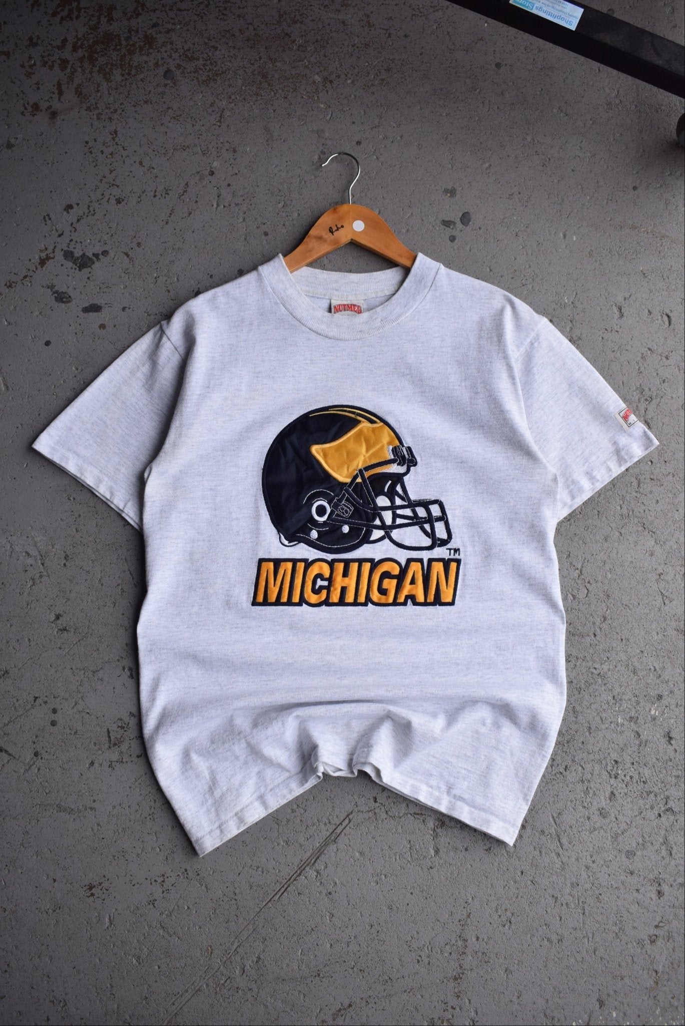 Vintage 90s Nutmeg x University of Michigan Football Embroidered Tee (S/M) - Retrospective Store