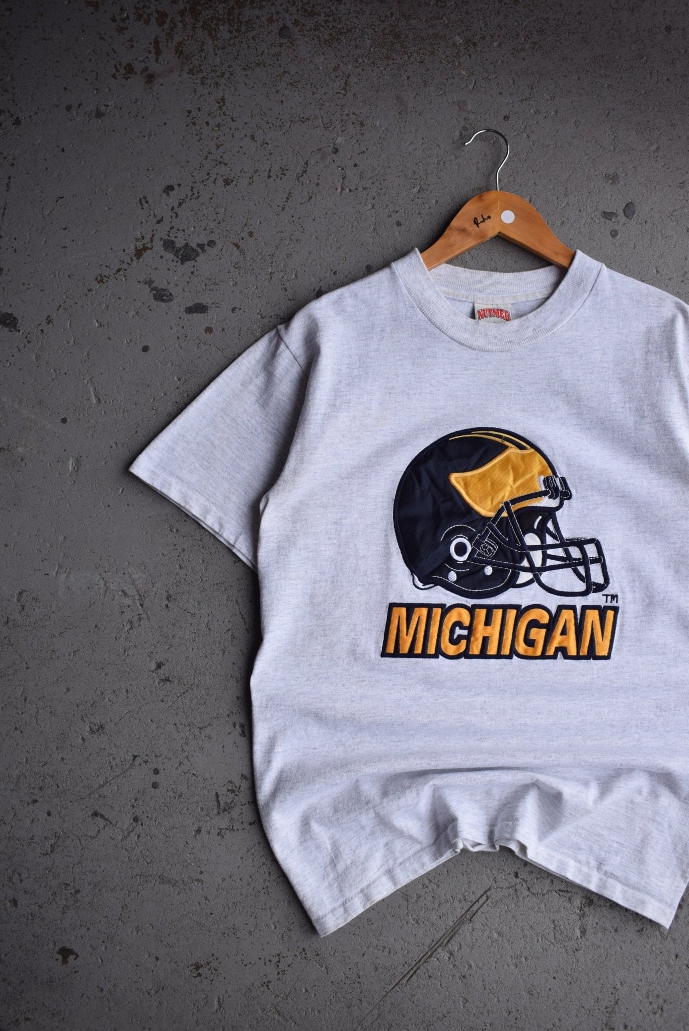 Vintage 90s Nutmeg x University of Michigan Football Embroidered Tee (S/M) - Retrospective Store