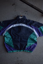 Vintage 90s Reebok Classic Logo Embroidered Quarter Zip Windbreaker Jacket (M) - Retrospective Store