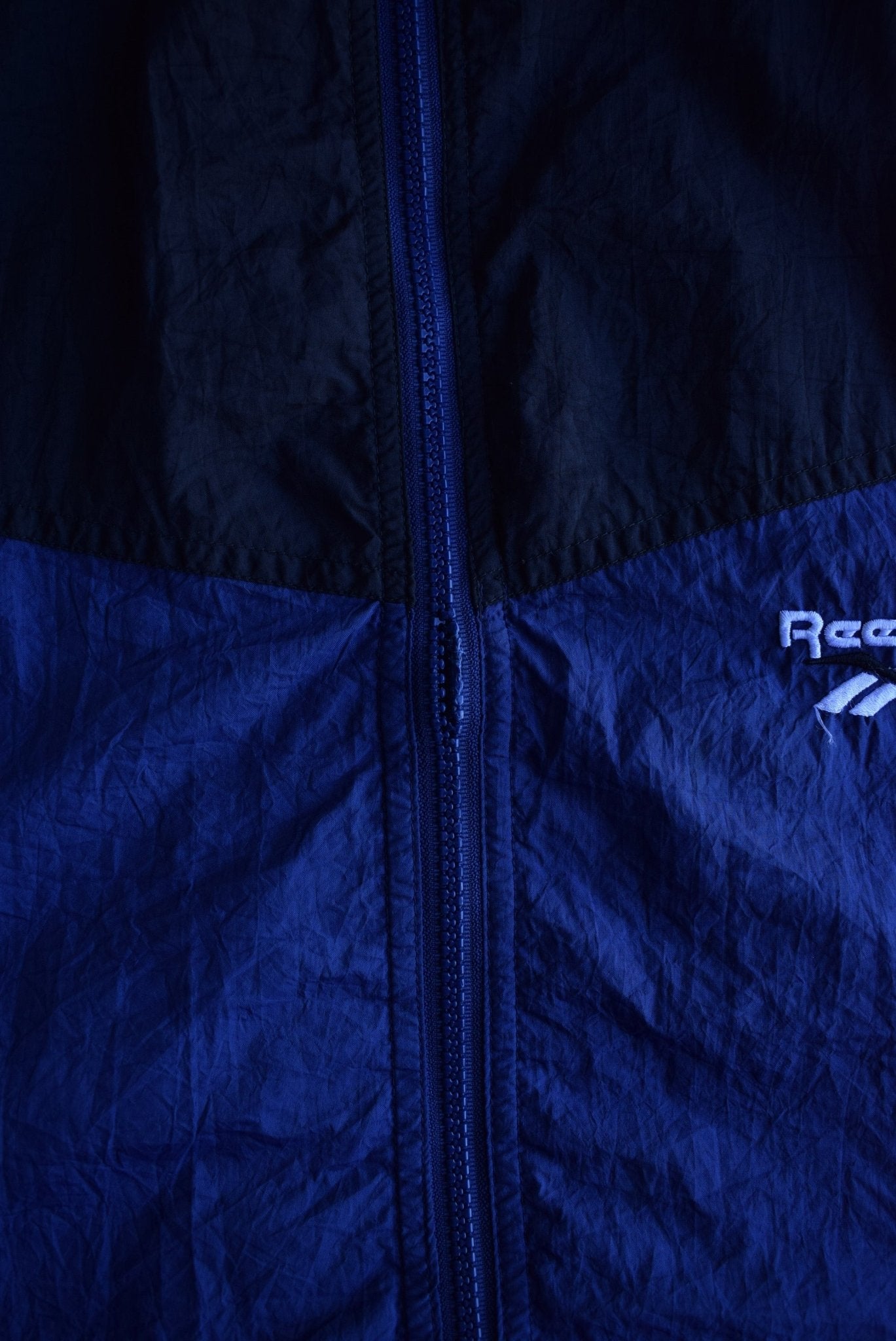 Vintage 90s Reebok Classic Logo Embroidered Windbreaker Jacket (L) - Retrospective Store