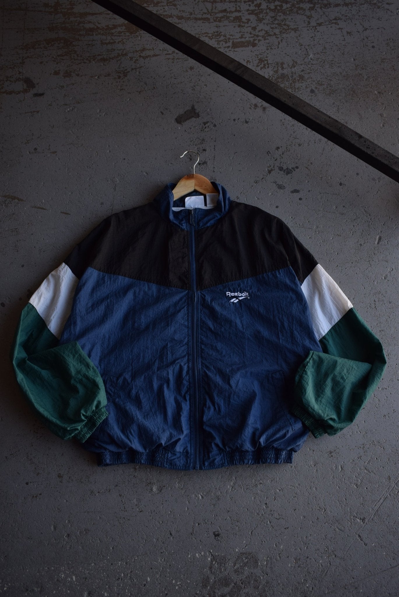 Vintage 90s Reebok Classic Logo Embroidered Windbreaker Jacket (L) - Retrospective Store