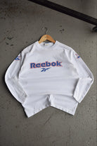 Vintage 90s Reebok Spellout Long Sleeve Tee (S) - Retrospective Store
