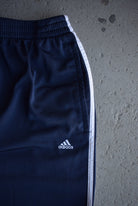 Vintage Adidas Classic Logo Embroidered Snap Track Pants (XL) - Retrospective Store